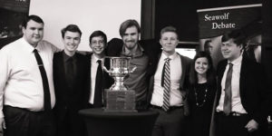 TKC Debate Team with trophy
