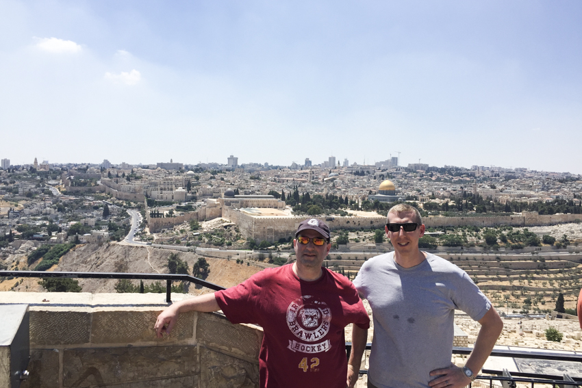 Joshua Blander and Andrew Johnson at a scenic overlook in Israel