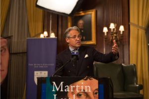 Eric Metaxas speaking from a podium