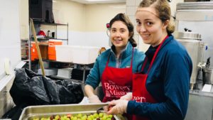 Two TKC students volunteering at the Bowery Mission