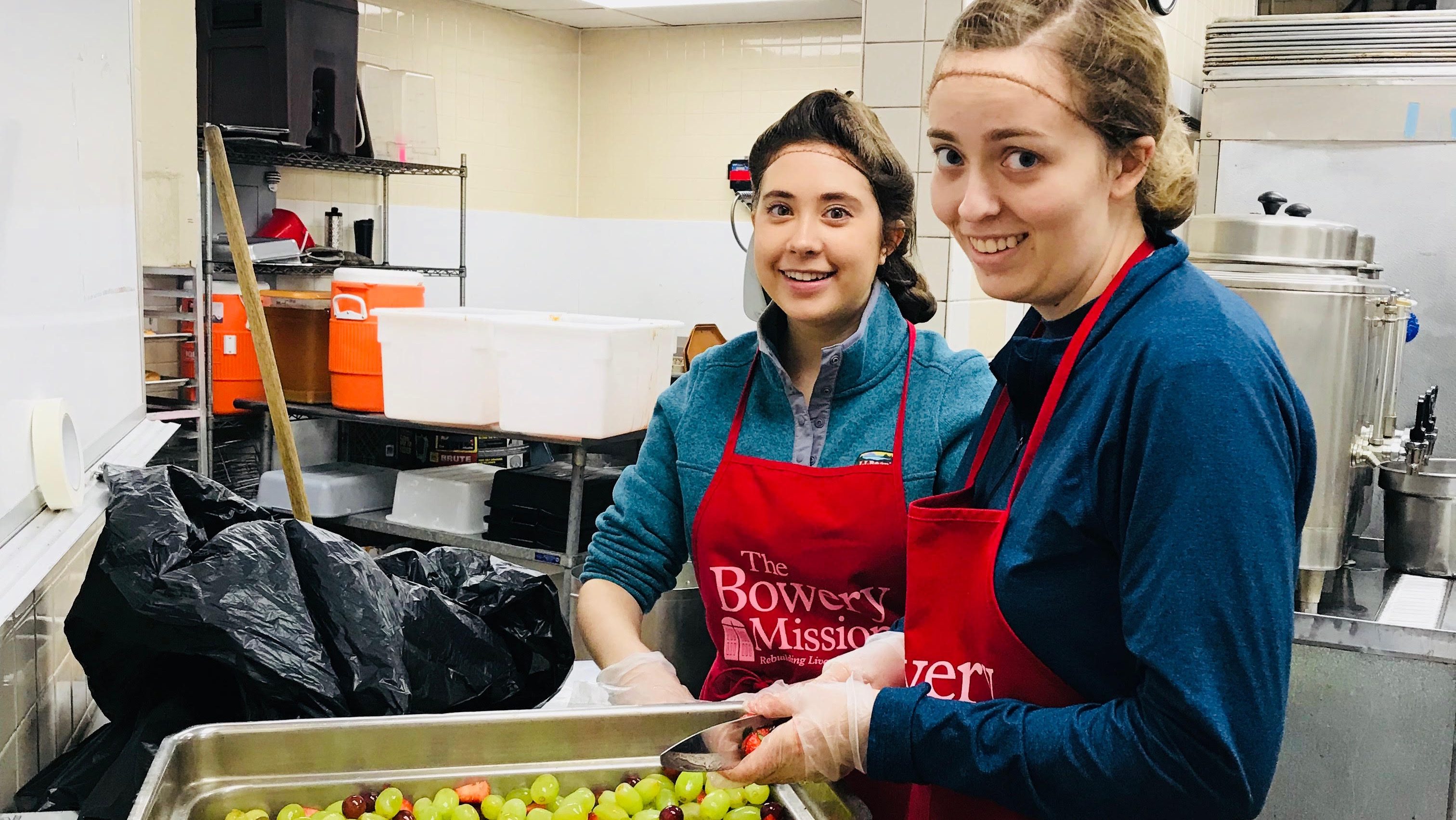 Two TKC students volunteering at the Bowery Mission