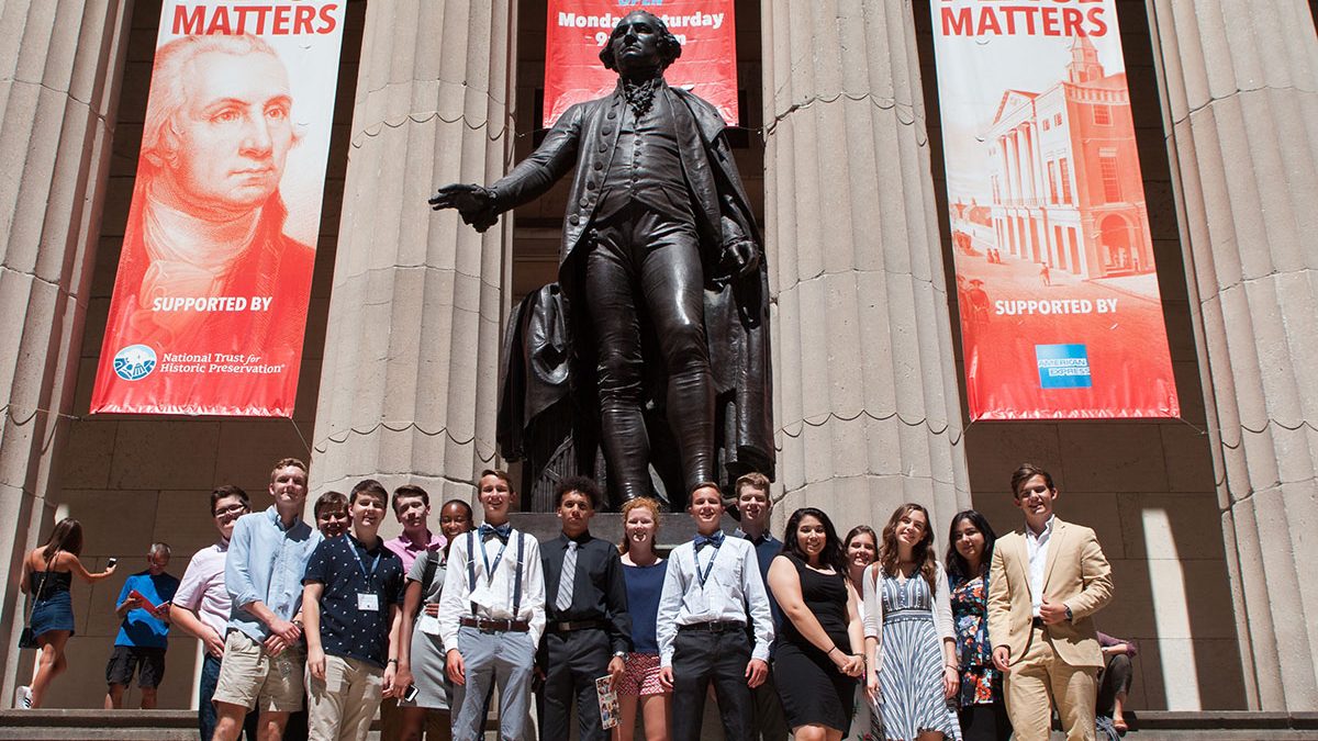 Summer academy students in front of Federal Hall