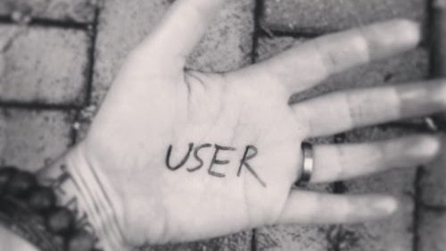 A hand with the word "user" written on it