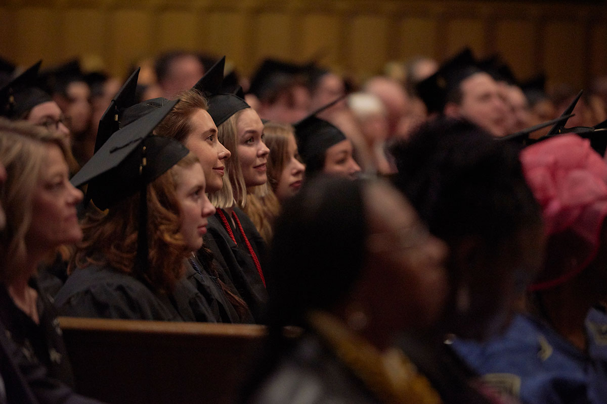 graduates at commencement