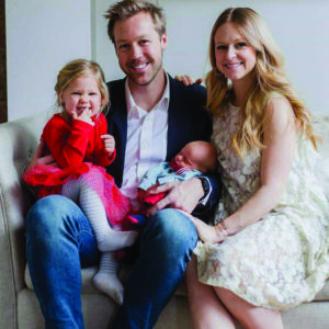 Alumnua Erin with family