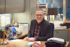 Eric Bennett at desk