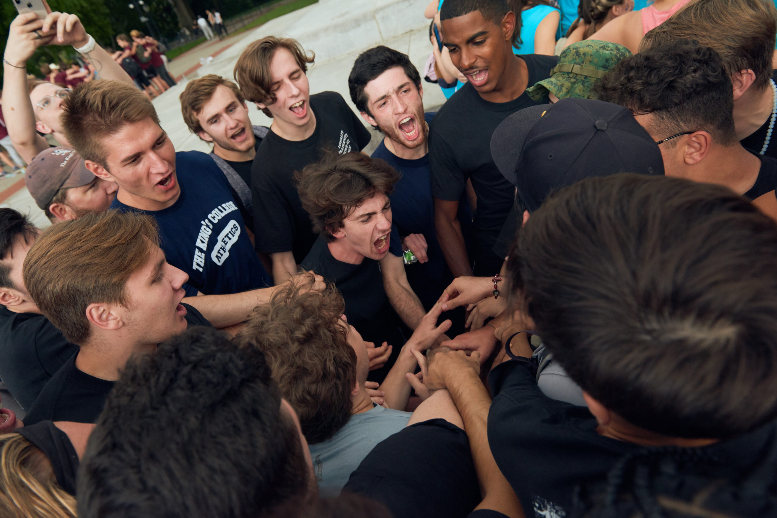 college guys celebrating after a college competition