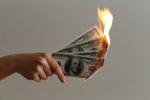 Dollar bills on fire