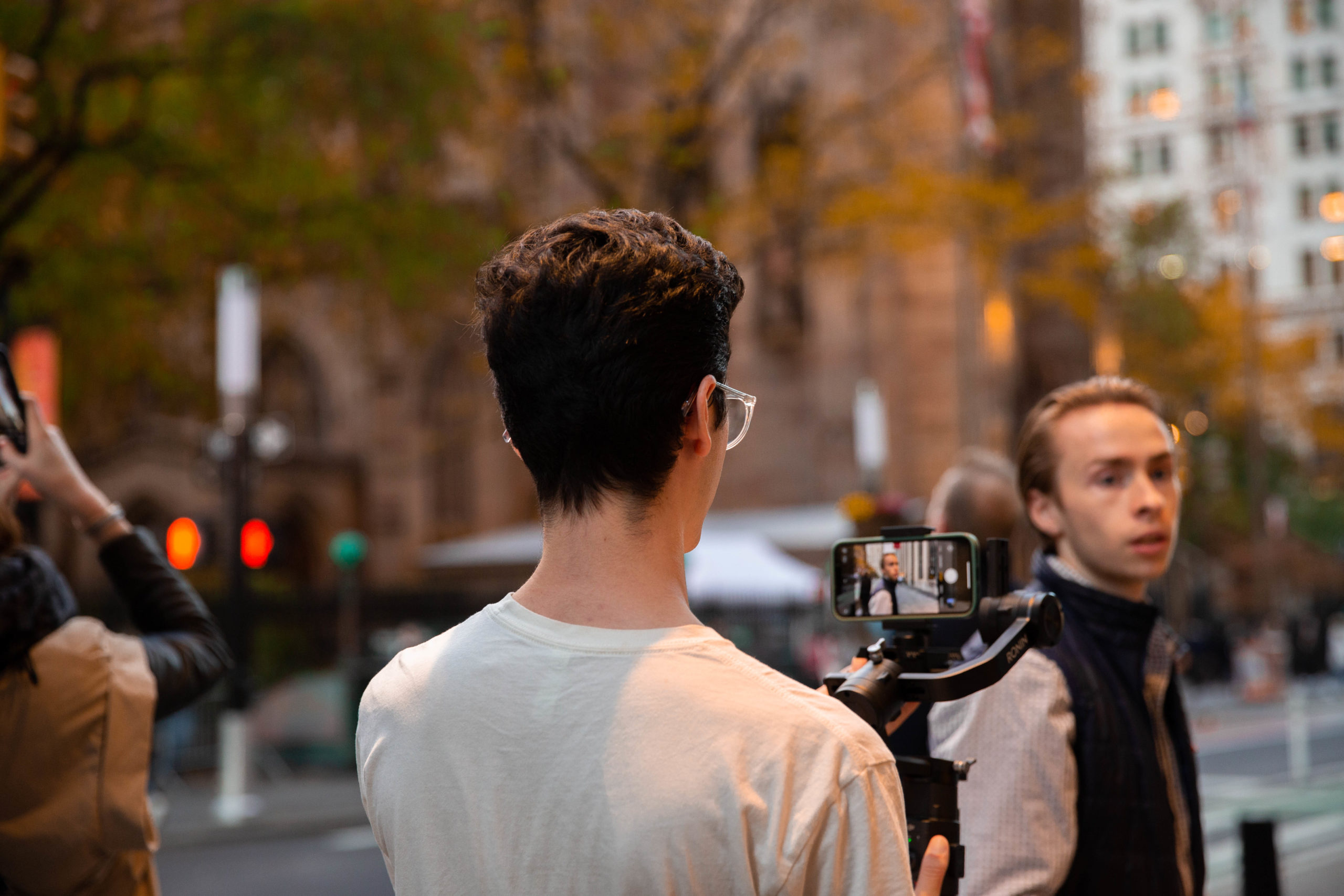 student filming a movie