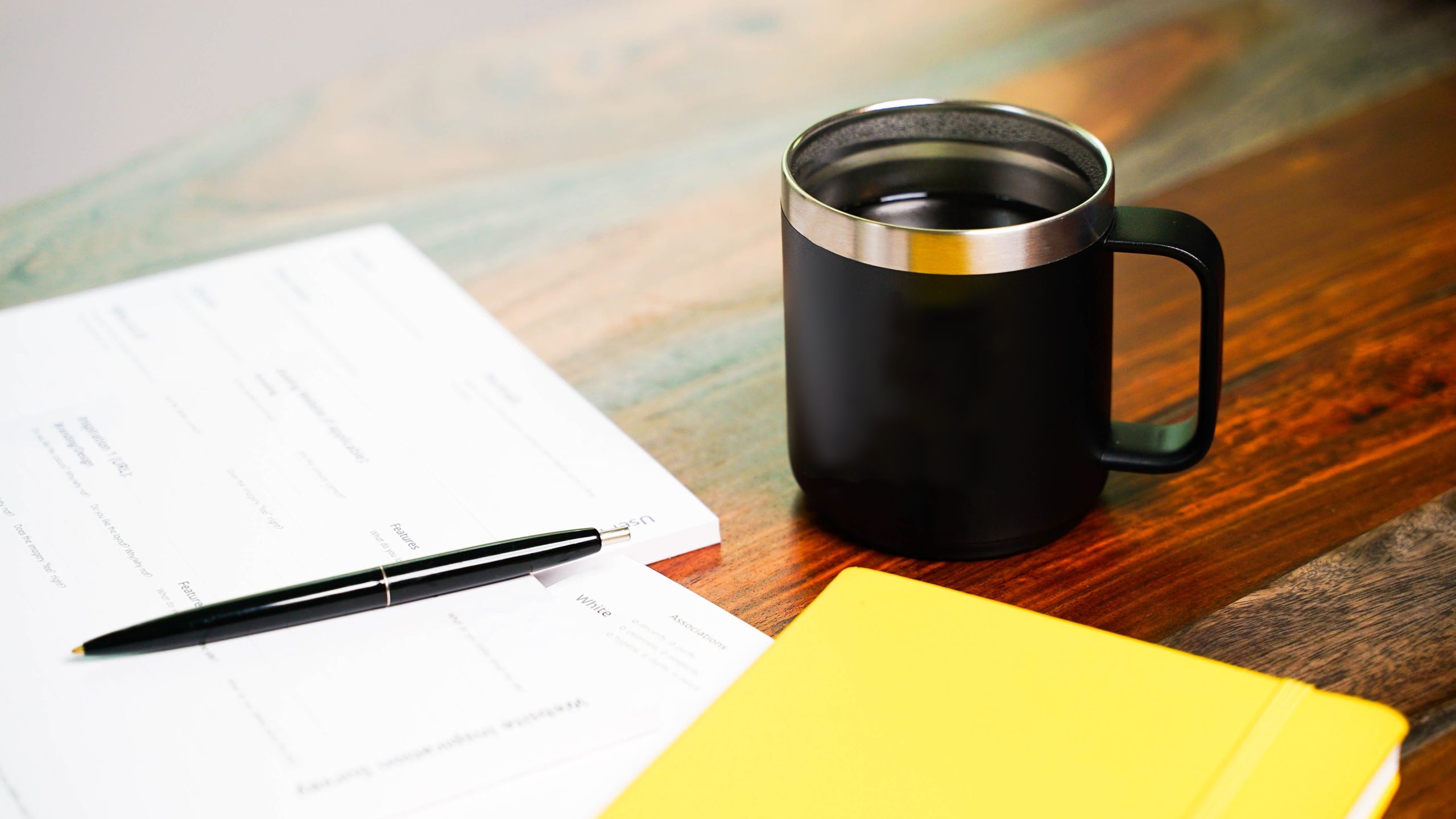 coffee mug and paperwork